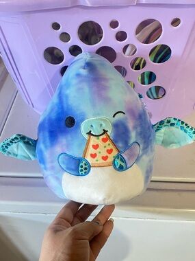 Terri the Pterodactyl Squishmallow plush stuffed animal with pizza